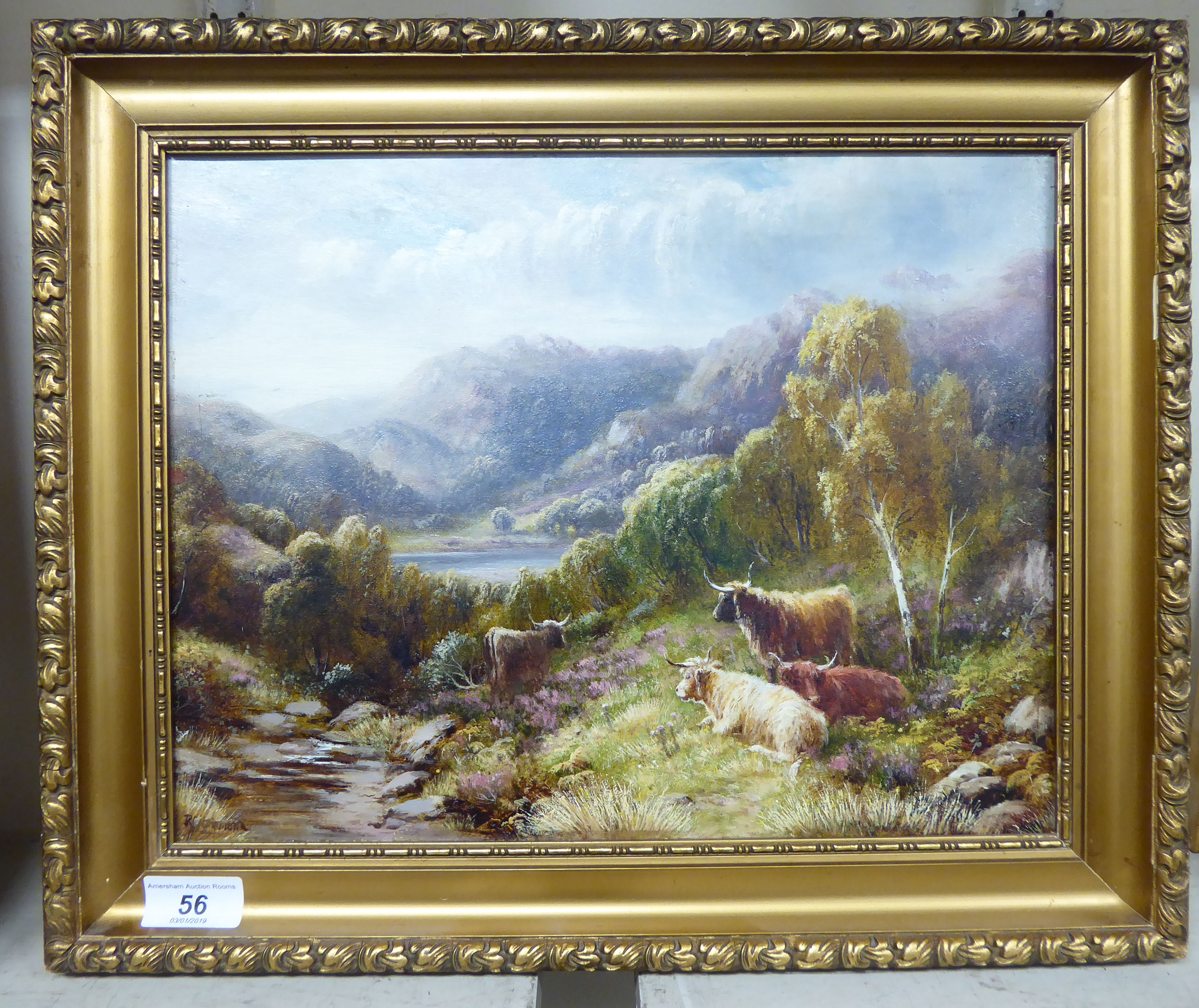 20thC British School - cattle on a hillside with a lake and mountains beyond oil on canvas bears