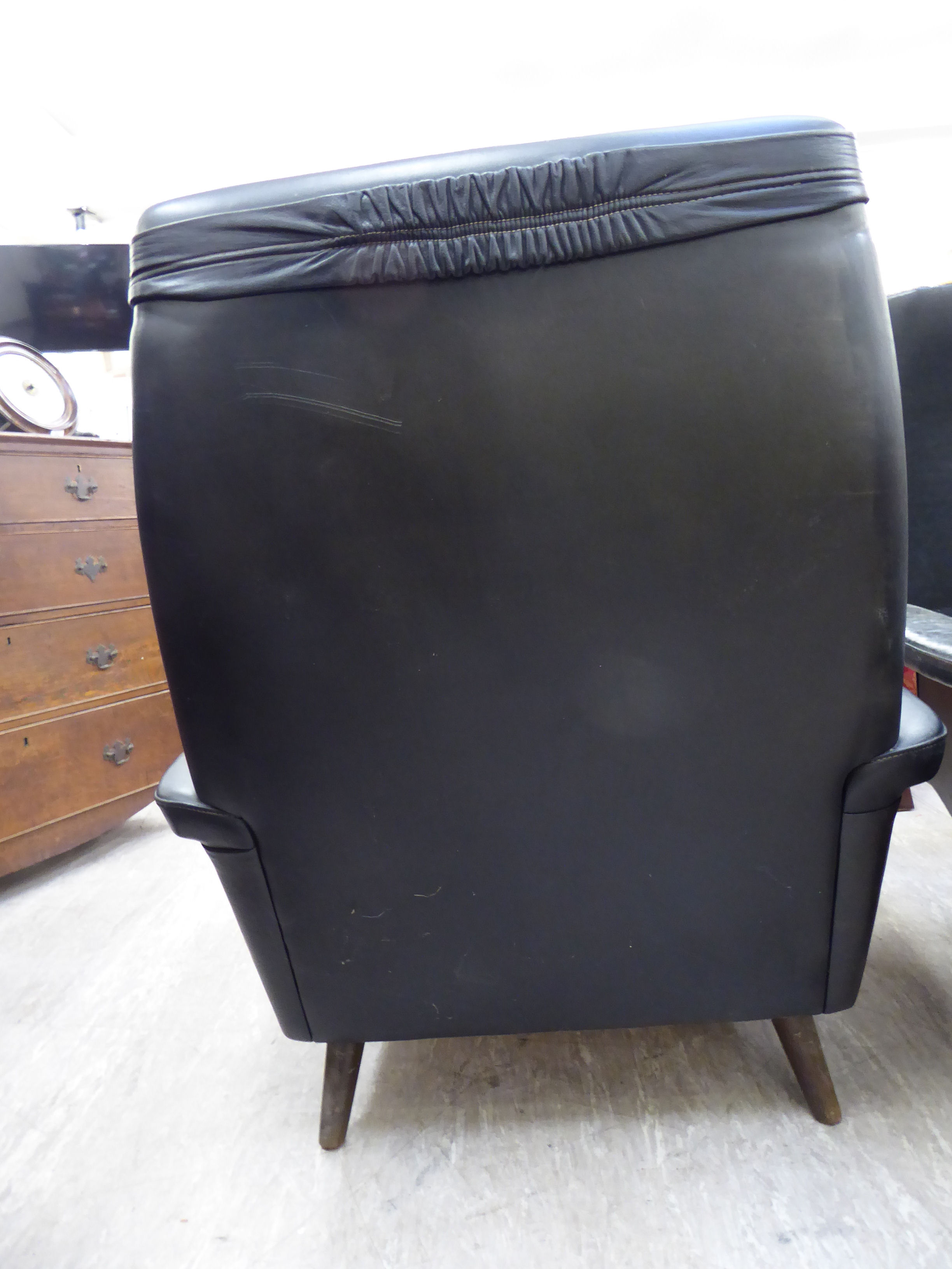 A 1960s/70s chair with a high back and low, level enclosed arms, upholstered in buttoned, - Image 4 of 4