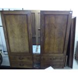 A late Victorian mahogany linen press with two panelled doors and a long drawer,