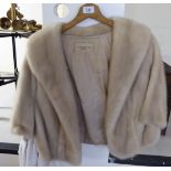 A 'vintage' blonde mink cape with a silk lining bears a label RC Winterson Ltd,