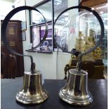 A pair of late 19thC cast brass servants' bells,