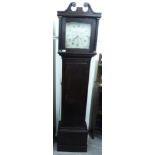 A late 18thC oak longcase clock, having a swan neck pediment and a waisted trunk,