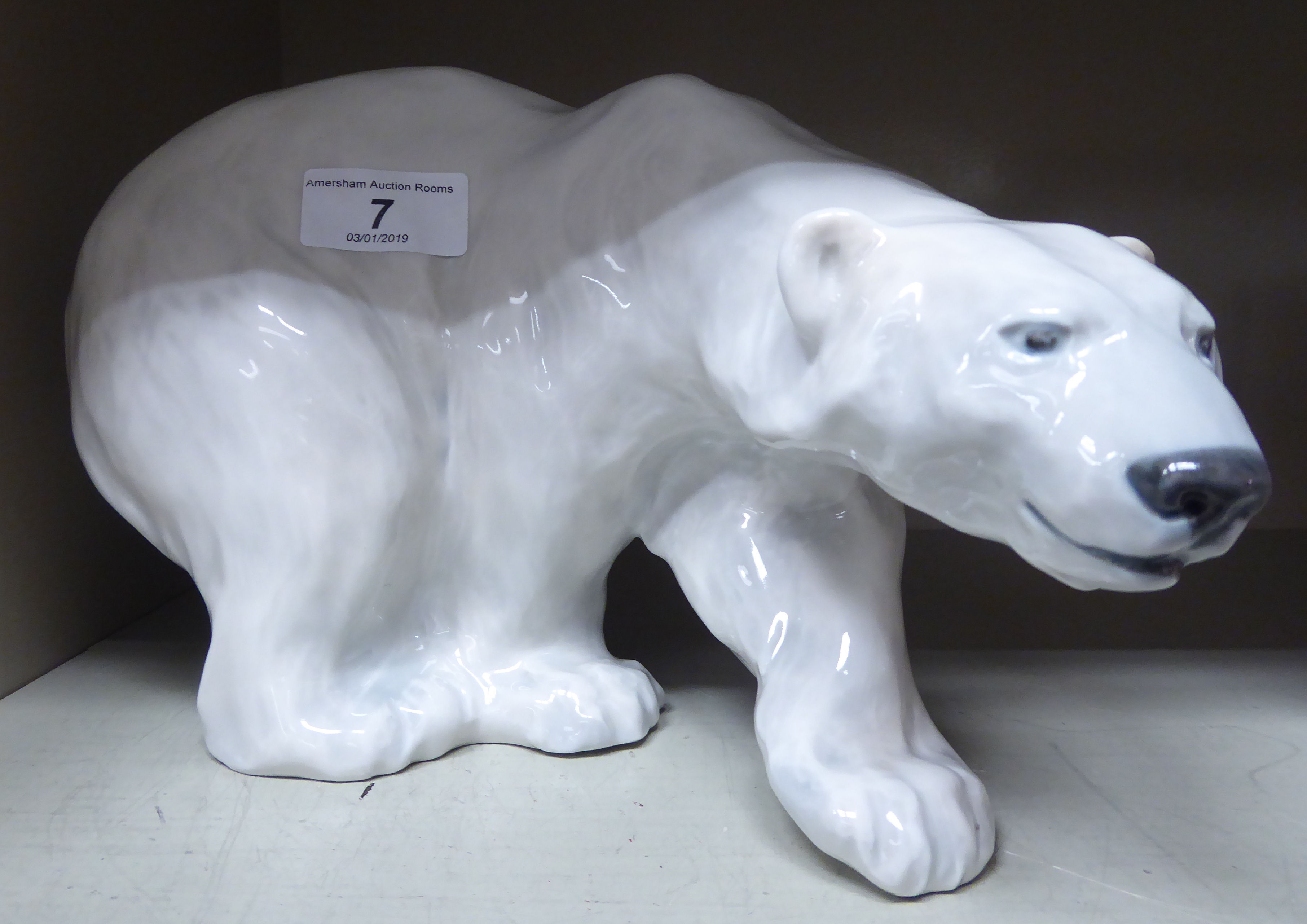 A Royal Copenhagen porcelain model, a standing polar bear no.