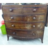 A late Victorian mahogany bow front dressing chest with two short/three long drawers,