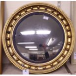 A Regency convex mirror,