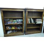 A pair of Victorian and later figured walnut open front bookcases with height adjustable shelves,