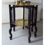 A mid 20thC Chinese brass tray top table,