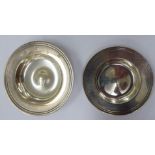 Two similar silver Armada design dishes mixed London marks 3.25'' & 3.