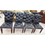 A set of four modern Ralph Lauren mahogany framed Telford chairs, button upholstered in black hide,