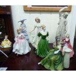 Eight ceramic figures: to include a Royal Doulton bone china example 'Picnic' HN2308 4''h