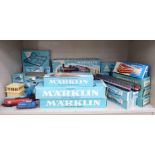 A Marklin 00 gauge diecast, tinplate and moulded plastic model train set comprising locomotives,