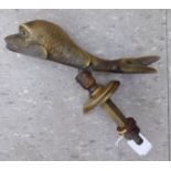 A late Victorian cast brass novelty door knocker, fashioned as a fish,