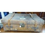 An early 20thC stitched brown hide trunk with straps 13''h 36''w SR