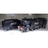 An 0 gauge tinplate clockwork model 4-4-2 locomotive and tender OS3