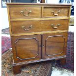 An early 20thC mahogany cabinet with two short/one long drawer and a pair of panelled doors,