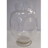 An early 20thC clear, blown glass vase of dimpled, baluster form with an upstand neck,