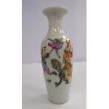 An early 18thC Chinese porcelain vase of tapered baluster form, having a narrow neck and flared rim,