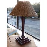 An Edwardian satinwood inlaid mahogany table lamp with a square, tapered column,