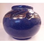 A Rookwood Pottery vase of bulbous form, decorated in sponged blue and a frieze of red,