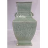 A late 19thC Chinese celadon glazed, twin handled porcelain vase of square section, baluster form,