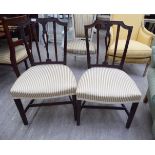 A pair of early 19thC Sheraton inspired mahogany framed dining chairs with carved,