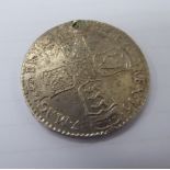 A William & Mary silver sixpence,