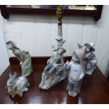 Five Lladro porcelain ornaments: to include a child playing with snails 8''h LSB