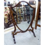 An Edwardian string inlaid mahogany toilet mirror,