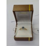 A 9ct gold aquamarine and diamond ring 11