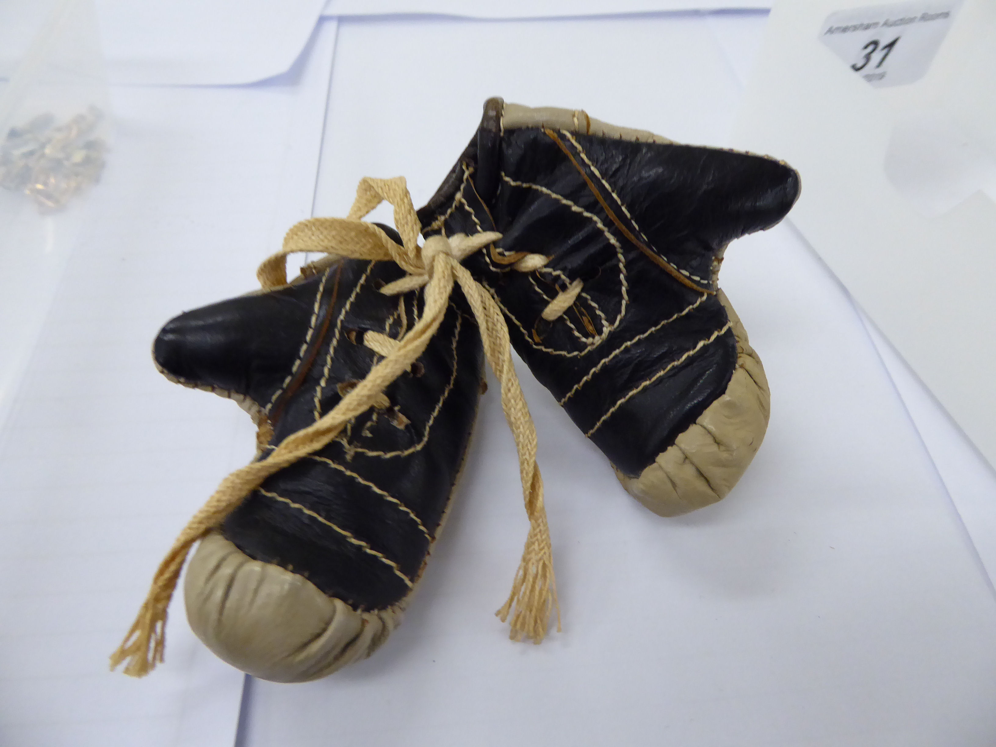 A pair of miniature two-tone brown leather boxing gloves, - Image 2 of 2