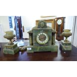 A late Victorian mottled green onyx and gilt metal mounted three piece clock garniture with a