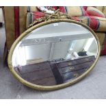 A 20thC 'antique' inspired mirror,