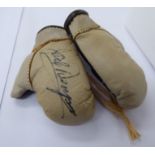 A pair of miniature two-tone brown leather boxing gloves,