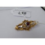 A 9ct gold brooch,