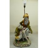 A 1970/80s Italian china table lamp, fashioned as a young woman sitting beside swans,