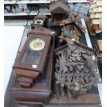 Six 20thC clocks: to include a Black Forest inspired carved pine cuckoo clock,