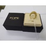 A Gioielli gold coloured (possibly 18ct) metal rope ring boxed 11