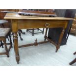 A late 19thC Continental fruitwood side table with a mitred and figured,