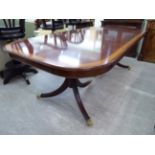 A modern Regency style mahogany dining table,