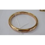 A 9ct gold hollow bangle 11