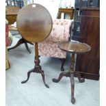 A late Victorian mahogany tip-top pedestal table, raised on a tapered column and tripod base 29.