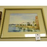 Ann Plested - a Mediterranean shoreline scene with a small town beyond watercolour bears a