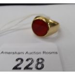 A 9ct gold cornelian set signet ring 11