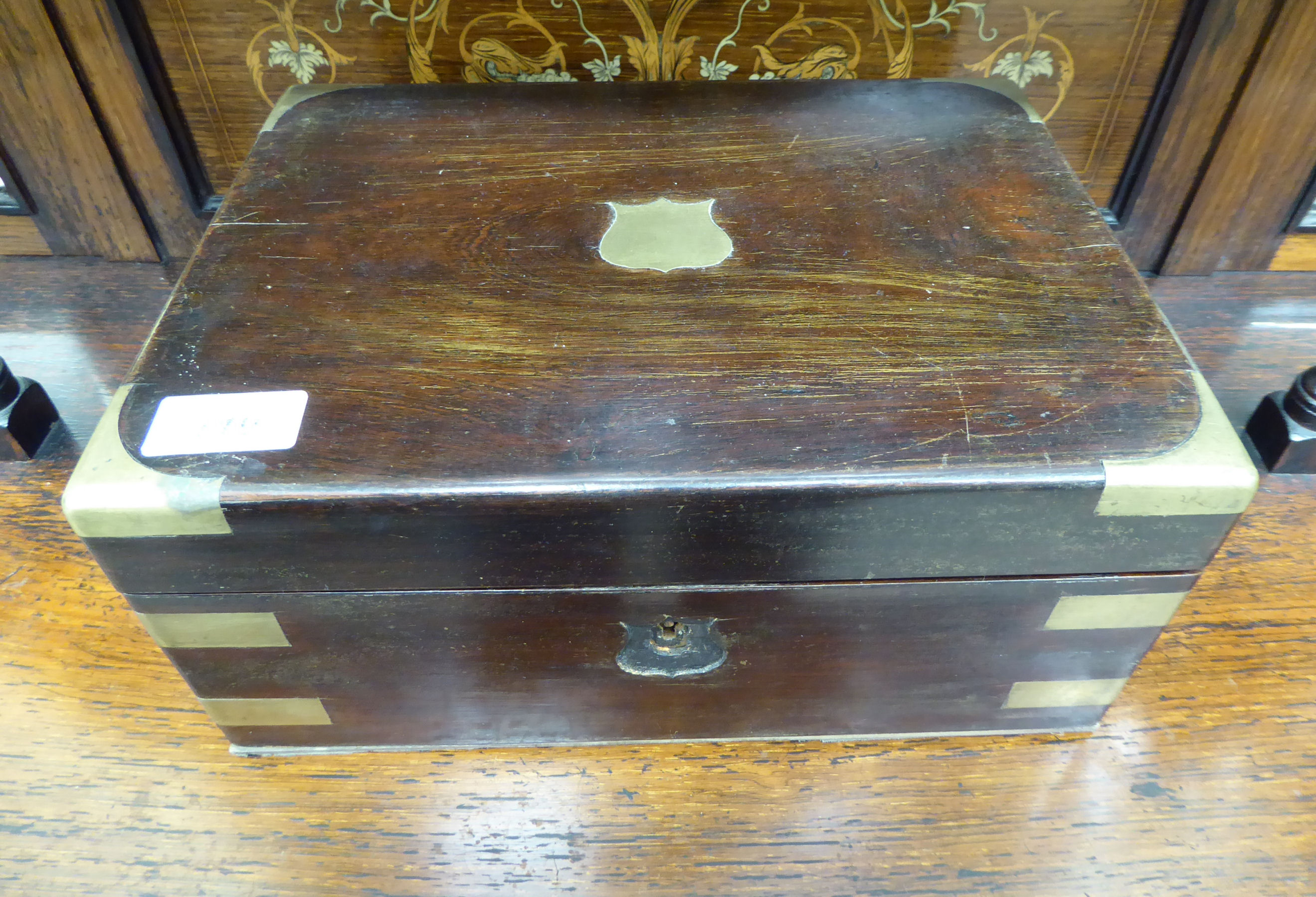 A late Victorian brass inlaid rosewood writing slope with straight sides and a hinged lid 5''h