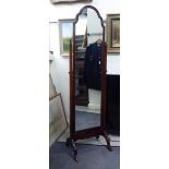 A modern cheval mirror, the round arched plate set in a mahogany frame with straight horns,