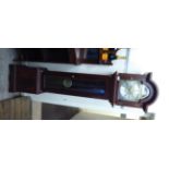 A modern mahogany finished granddaughter clock;