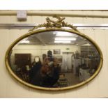 A 20thC 'antique' inspired mirror,