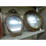 Two dissimilar 'antique' inspired mirrors,