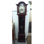 A modern mahogany finished granddaughter clock;