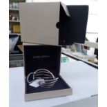 A Georg Jensen Alliance silver bangle boxed 11